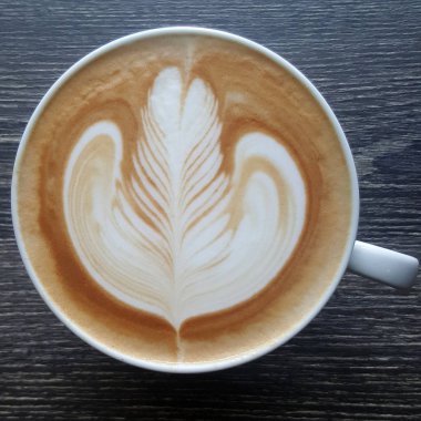 Latte sanat kahve bir fincan Üstten Görünüm