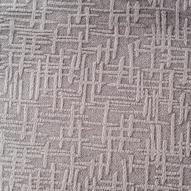 Gri kumaş arkaplanı kusursuz bir şekilde kapatılmış. Dekoratif malzeme.