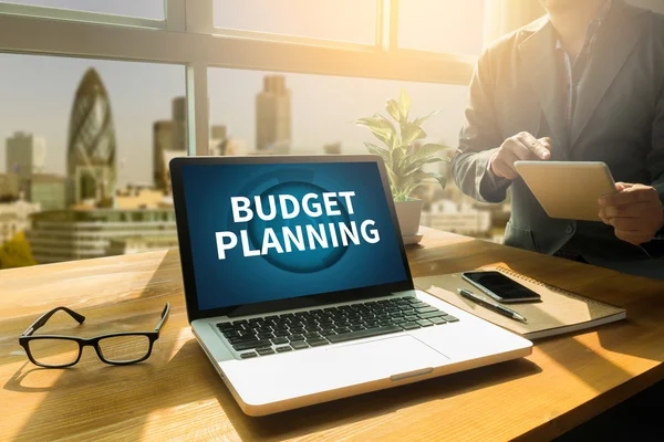 Businessman working at office desk and using computer and objects — Stock Photo, Image