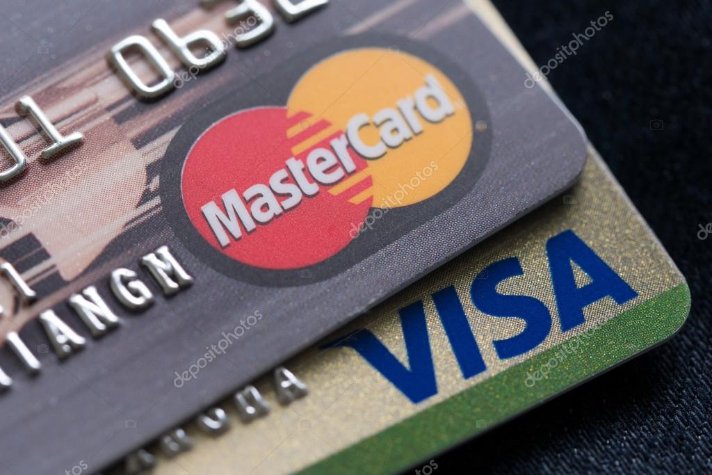 Bangkok, Thailand - 24 feb 2016 : Mastercard, Maestro and Visa credit cards in jeans pocket.