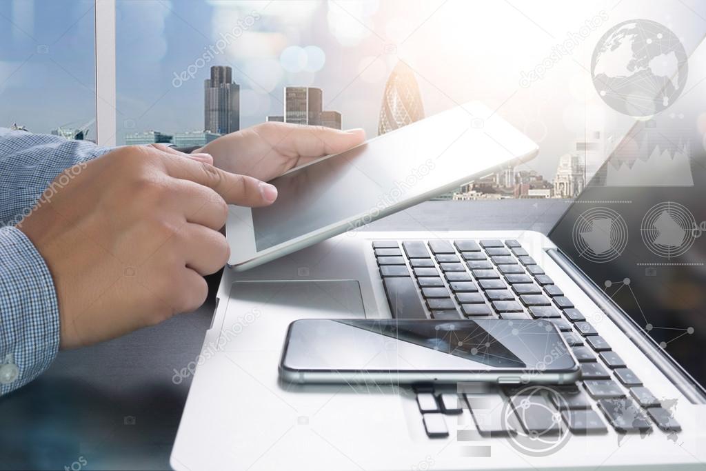 designer working digital tablet and computer laptop and digital 