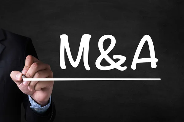 M & A (MERGERS AND ACQUISITIONS ) — стоковое фото