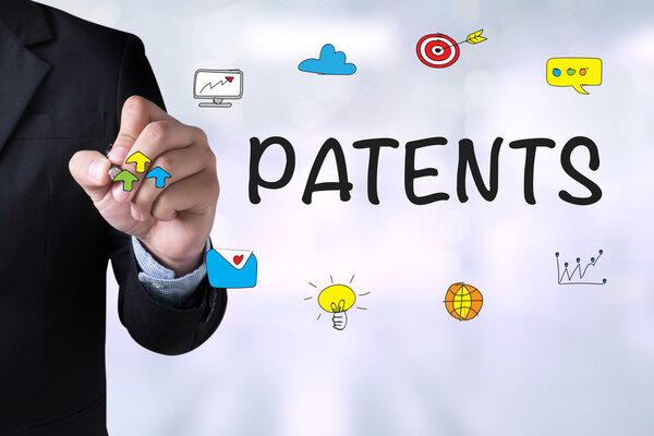  Businessman drawing Landing Page on blurred abstract background