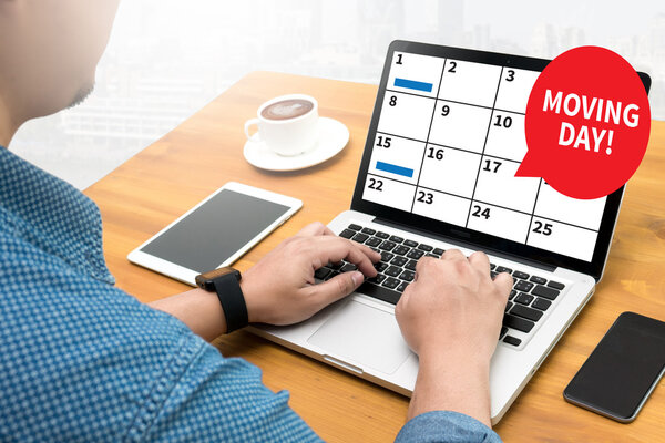 Thoughtful male person looking to the digital phone screen,Silhouette top computer and hand