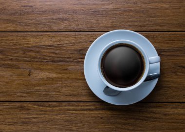 Beyaz fincan kahve vintage ahşap üzerine. Üstten Görünüm, Kupası ahşap t