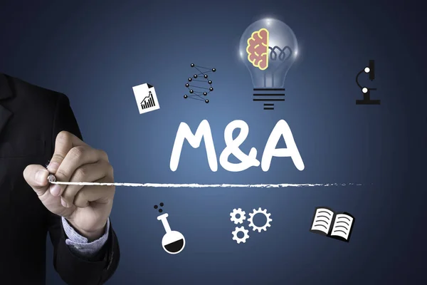 M&A (MERGERS AND ACQUISITIONS)  , Businessman working at office — Stock Photo, Image