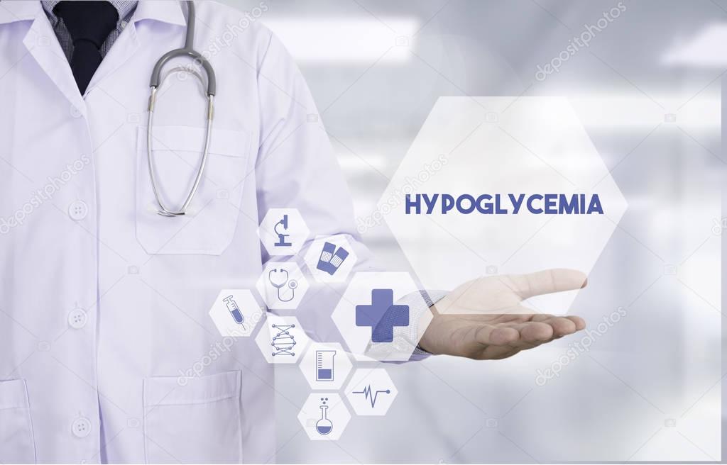 Hypoglycemia Professional doctor use computer and medical equipm