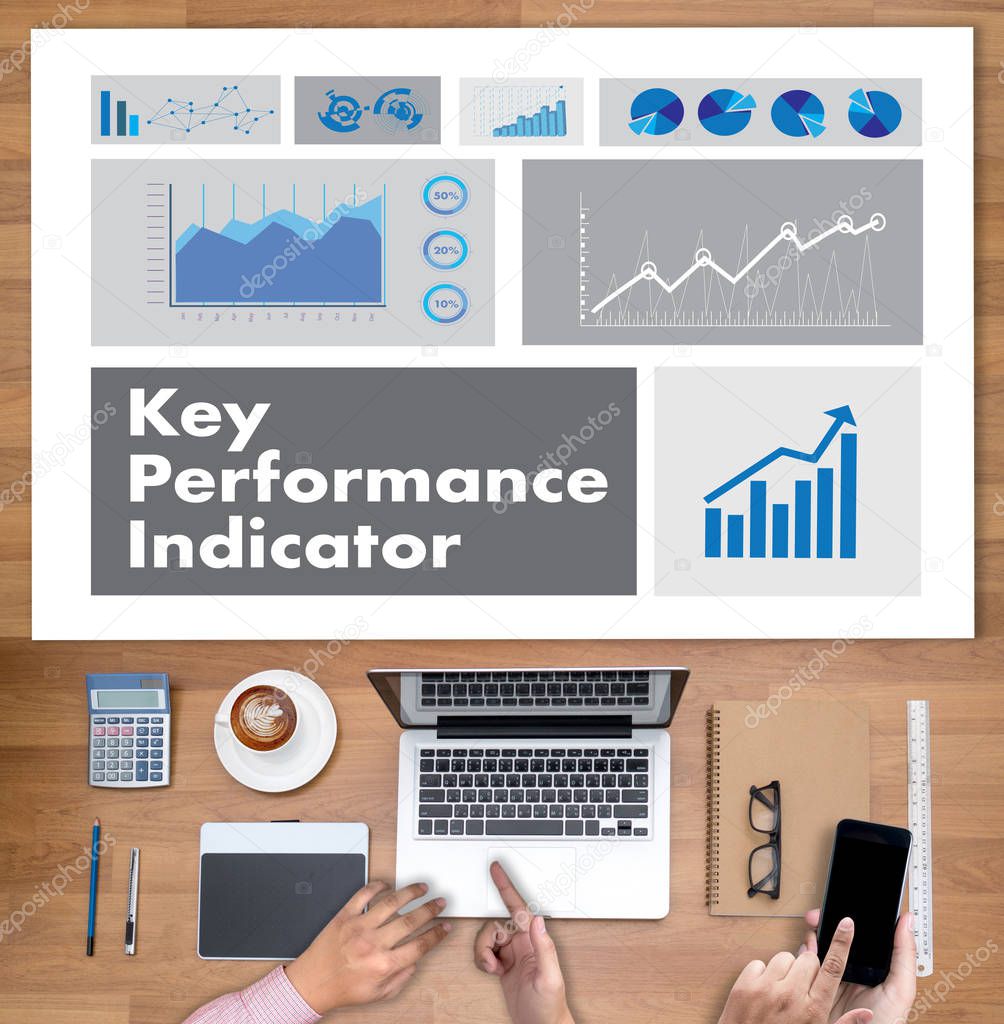 KPI acronym (Key Performance Indicator) Plan businessman hand wo