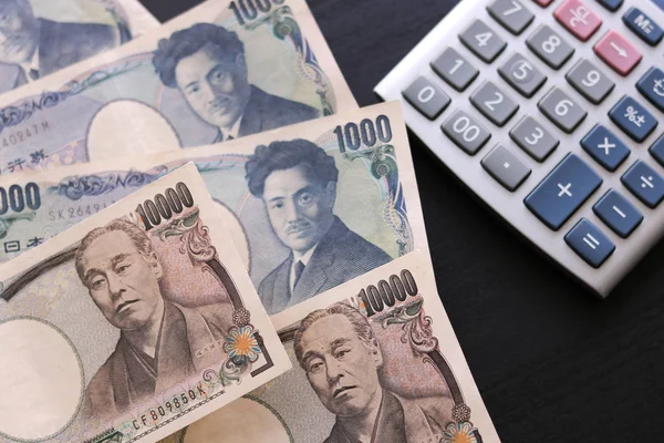 Yen geld concept Notitieachtergronden close-up van Japanse munt yen bank — Stockfoto