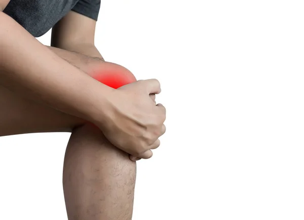 Knieschmerz Mann läuft mit starken athletischen Beinen hält Knie — Stockfoto