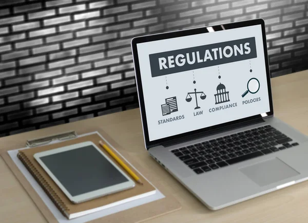 REGULATIONS and COMPLIANCE Rules Law professionals businessman w — Stock Photo, Image