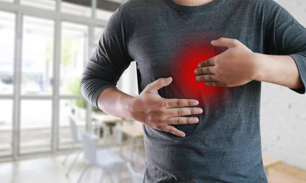 MAN with symptomatic acid reflux , suffering from acid reflux — Stock Photo, Image