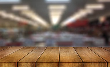 -ebilmek kullanılmış göstermek için ürün üzerinde boş ahşap masa blurr