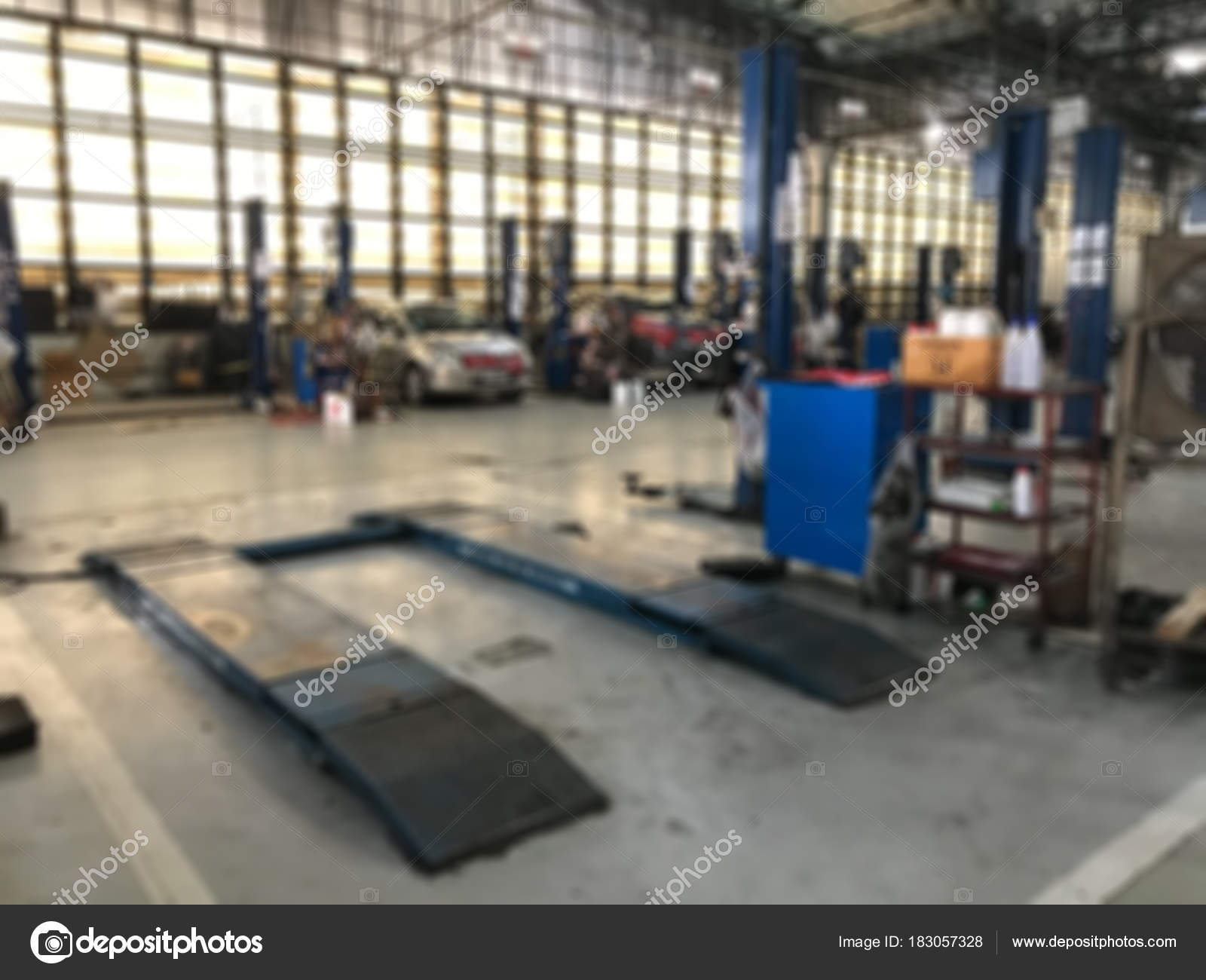 Car repair center auto repair service station blurred backgroun Stock