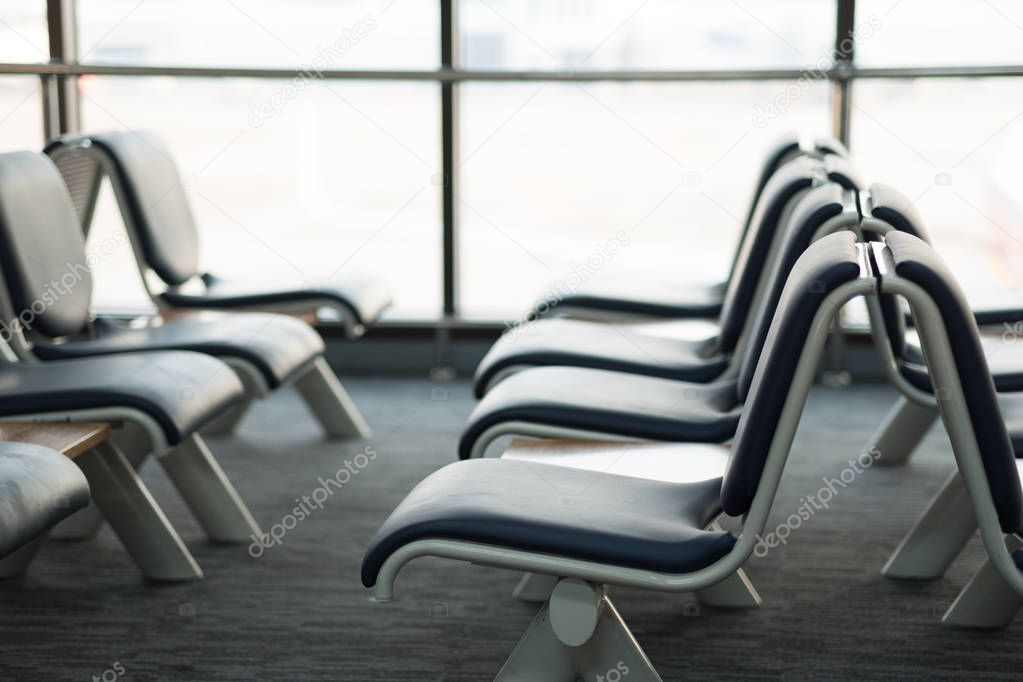 Empty airport terminal waiting area with chairs lounge with seat