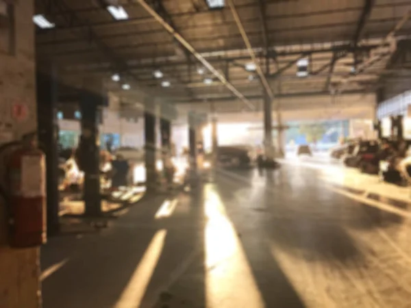 Carro centro de reparação de automóveis estação de serviço de reparação desfocado backgroun — Fotografia de Stock