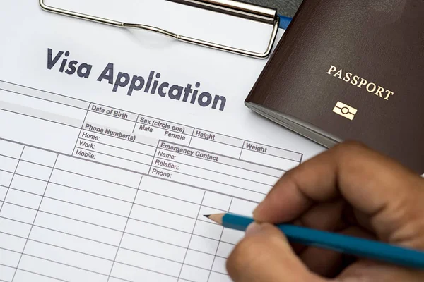 Bir belge para Göçmenlik seyahat için başvuru formu vize için — Stok fotoğraf