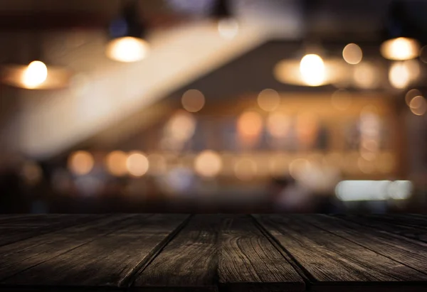 Drewniana deska pusta tabela kawiarnia, kawiarnia, bar, niewyraźne backgro — Zdjęcie stockowe