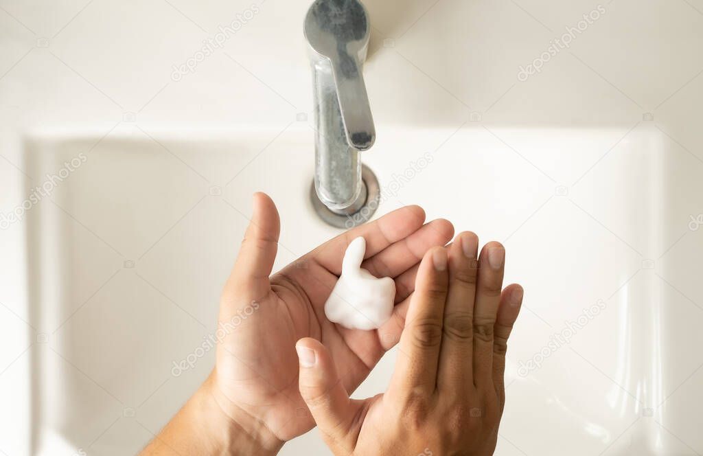 stop spreading coronavirus sanitizer  man Washing hands with soap man for corona virus pandemic hygiene