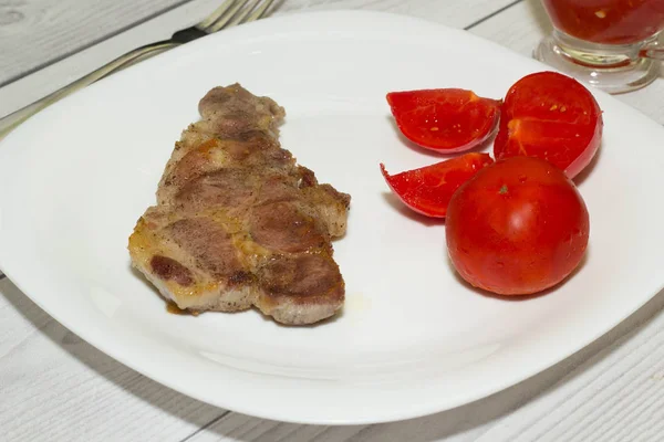 Domates soslu kızarmış domuz eti