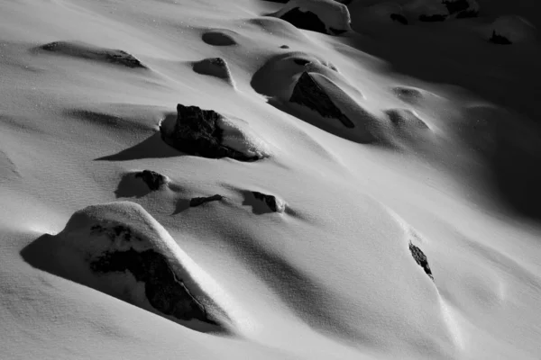 A part of snow mountain in south island, New Zealand. Beautiful view with snow in black and white.