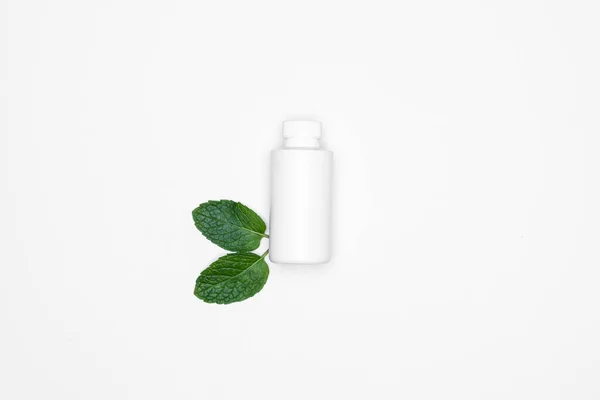 White Bottle Fresh Herbs Mints Isolated White Background Copy Space — Stock Photo, Image