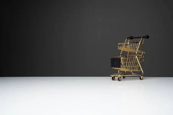 Small Empty Shopping Cart Metal Trolley Golden Colour Top White — Stock Photo, Image