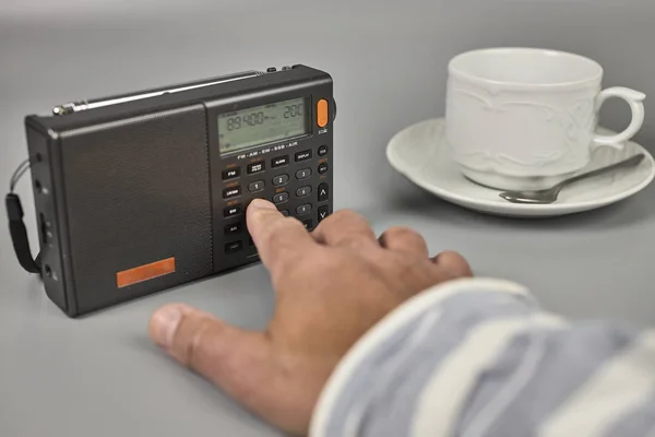 Man Hand Tuning Small Radio Receiver — Stock Photo, Image
