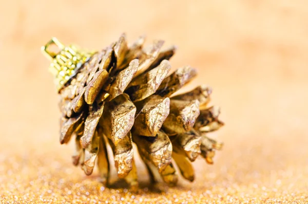 Gold pine cones. — Stock Photo, Image