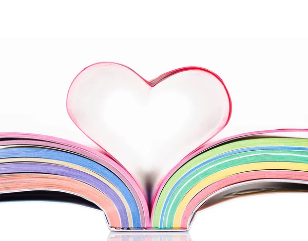 Opened book with sheets in the form of heart. — Stock Photo, Image