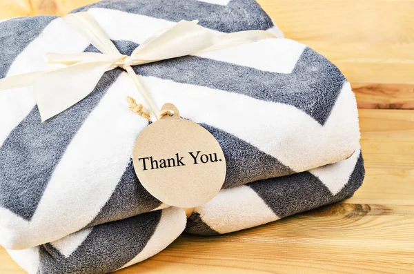 Blanket with Thank you tag gift with ribbon. — Stock Photo, Image