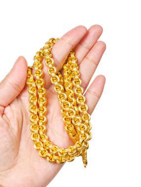 Sol elinde altın kolye.