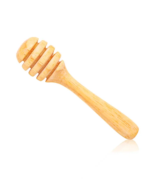 Wooden honey stick isolated on white. — Stock Photo, Image