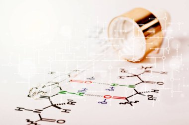 Kimyasal formül kağıt üzerinde laboratuvar cam pipet.