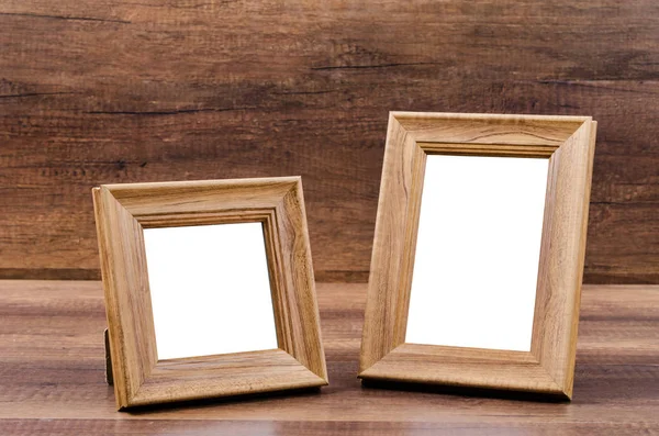 Houten frame op houten achtergrond. — Stockfoto