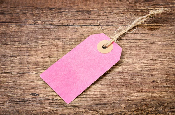 Üres rózsaszín papír címke ár. — Stock Fotó