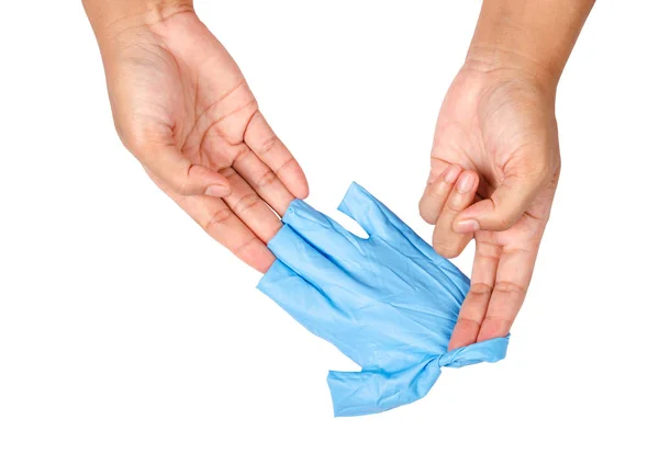 Hand throwing away blue disposable gloves. — Stock Photo, Image