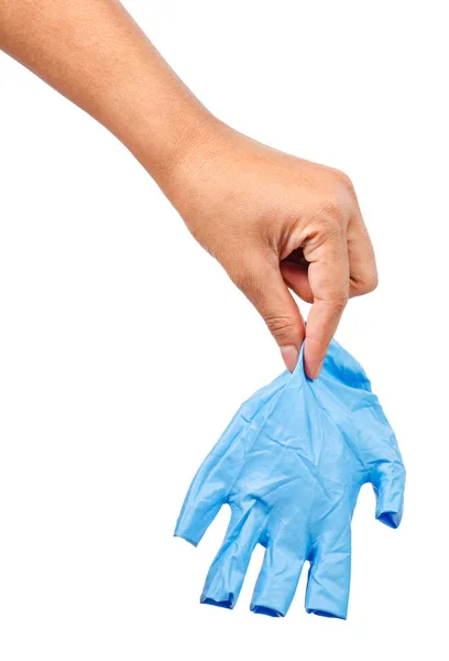 Mano tirando guantes desechables azules . — Foto de Stock