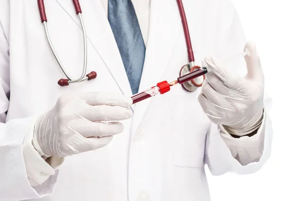 Cropped shot of doctor taking blood sample from syringe to blood — Stock Photo, Image