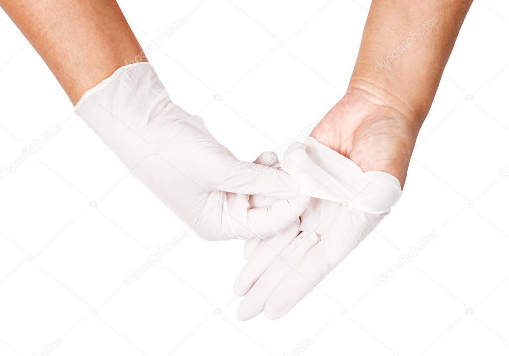 Hand throwing away white disposable gloves medical.