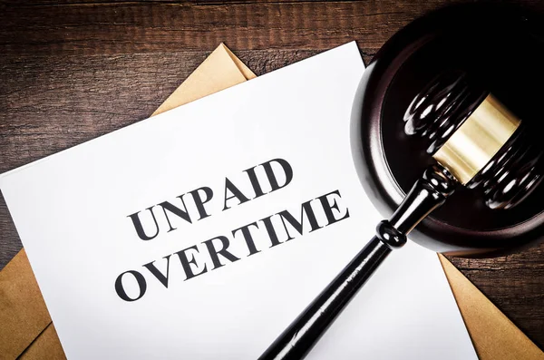 Unpaid Overtime title On Legal Documents. — Stock Photo, Image