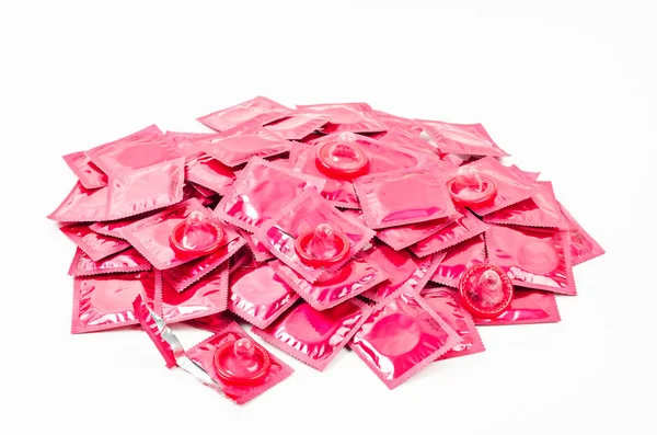 Heap of pink condoms pack. — Stock Photo, Image