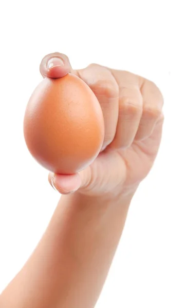 Uovo in mano isolato su bianco — Foto Stock