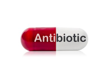 Antibiyotik ile kırmızı ve beyaz hap kapsül.