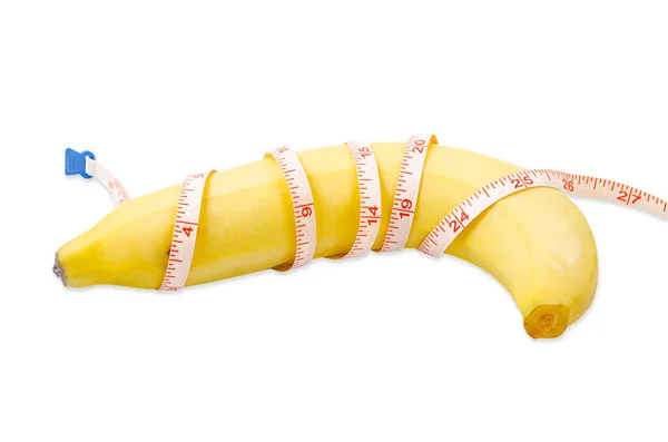 Fresh banana with measuring tape isolated on white background. — Stock Photo, Image