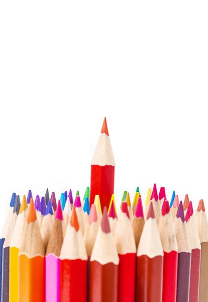 Red pencil standing out from others — Stock Photo, Image