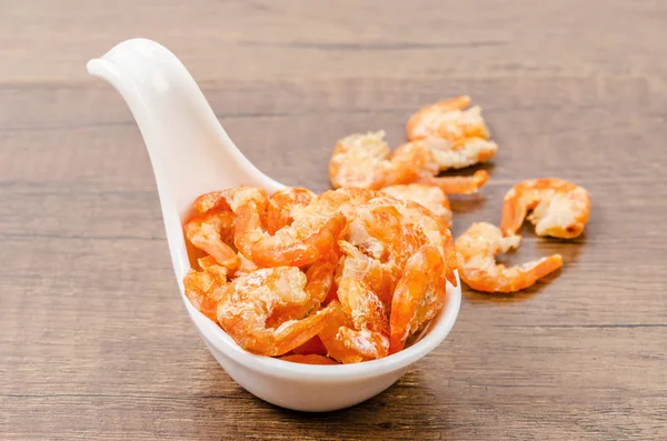 Dried shrimp in white spoon. — Stock Photo, Image