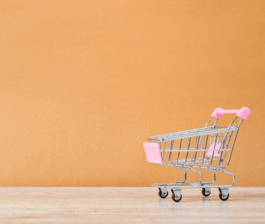 Beautiful pink shopping cart. clipart