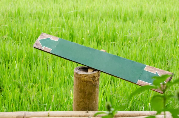 Wood label in the nature rice field. — Stock Photo, Image