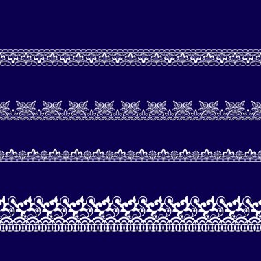 Beyaz dantel kurdeleler kümesi